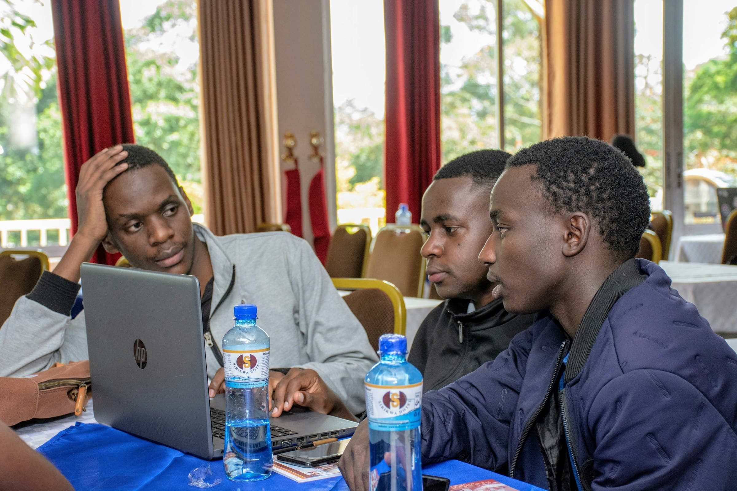 EXWHYZEE engineers working together